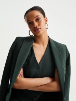 WE FASHION Klassieke Blazers Gilet Dames Donkergroen -Kledinglijn Winkel 19080cfac0835a14cca2b5362182aca6